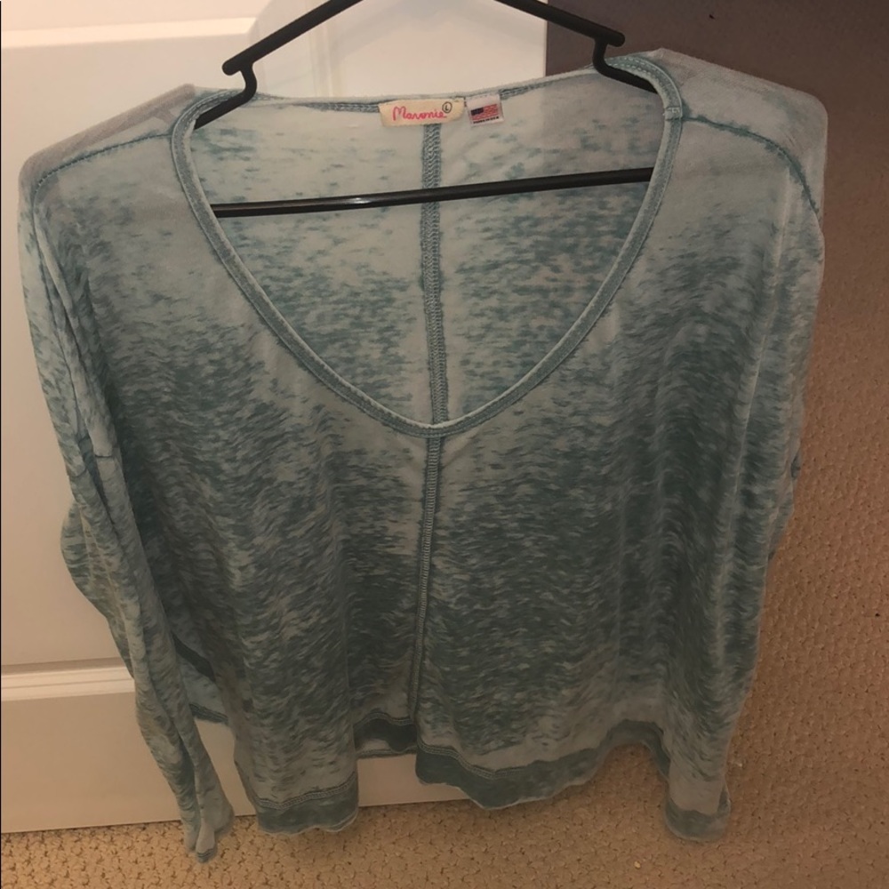 Adorable thin washed out turquoise blouse